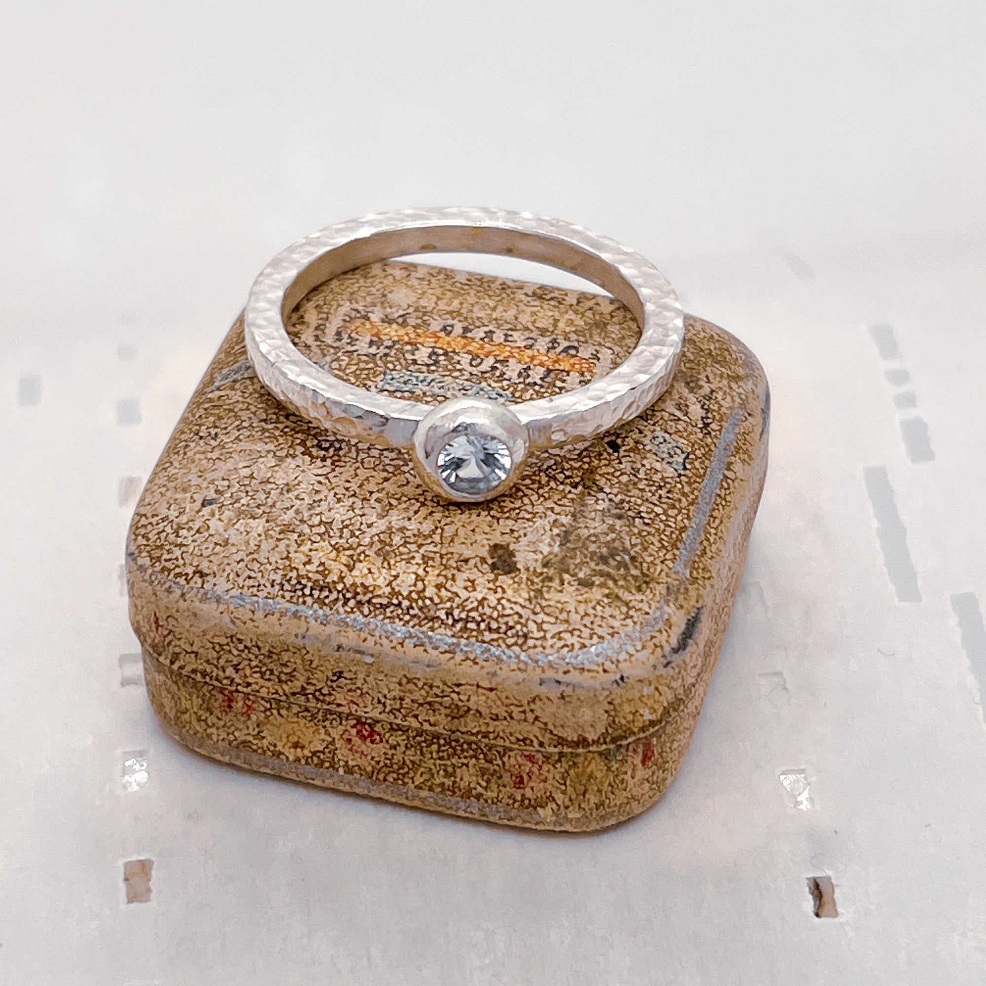 4mm White Sapphire in a sterling silver ring