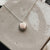 Comoda Necklace - Brushed Bronze