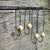 Infinita Drop Earrings - Matte Brass